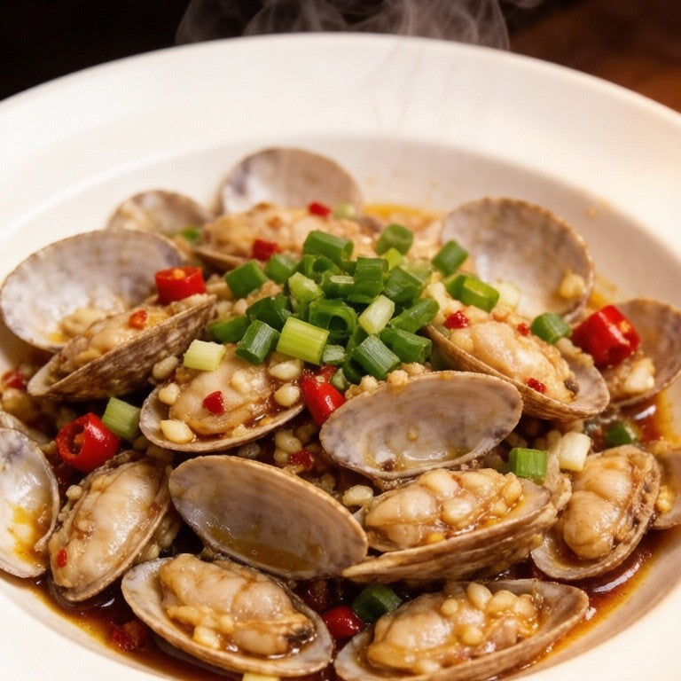 Fresh thin-shell coquina clams on ice with lemon (3)